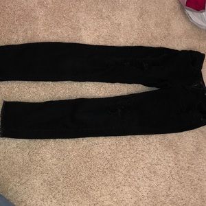 Black patched denim jeans (slightly cropped)